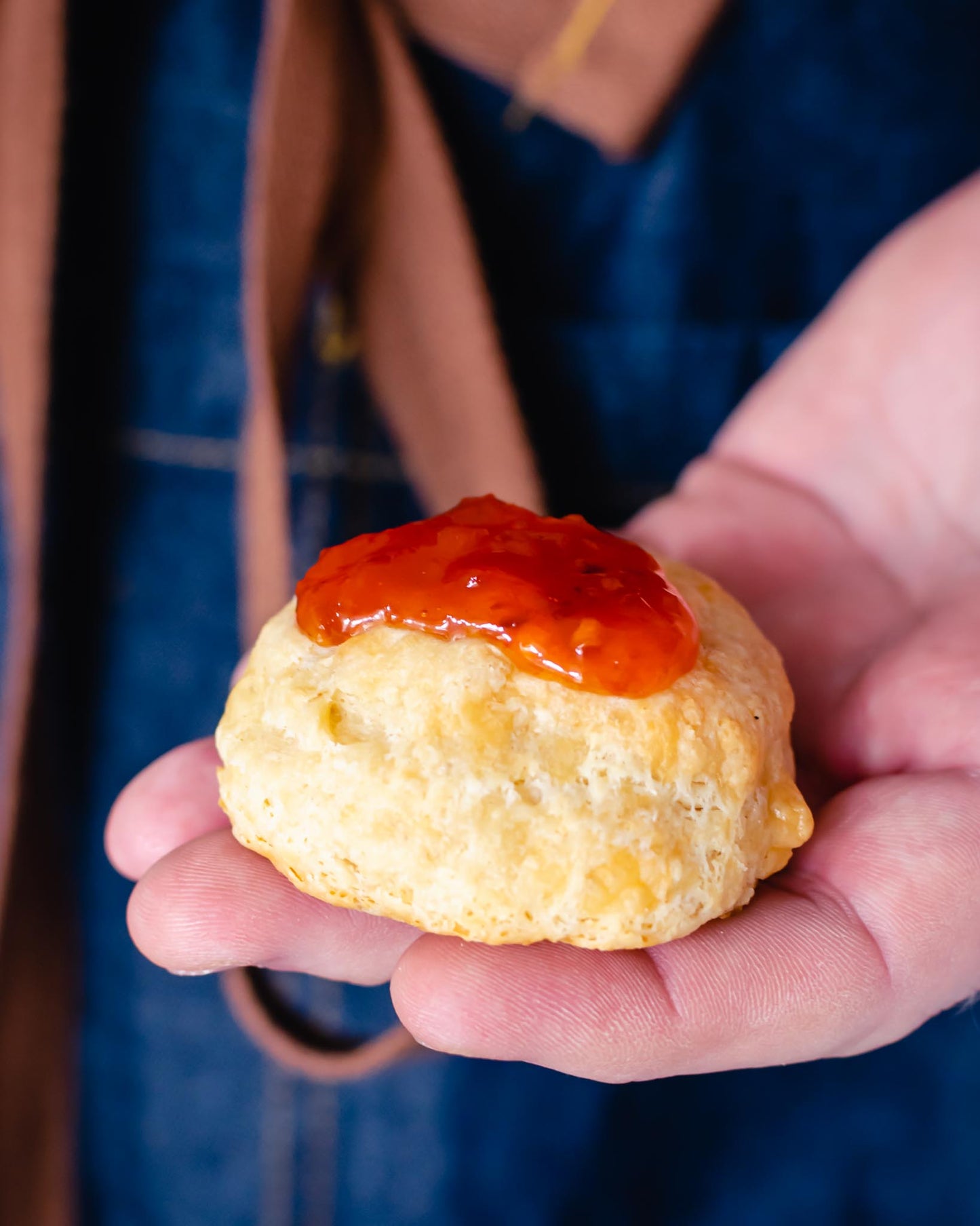 Red pepper chutney on a cheese scone